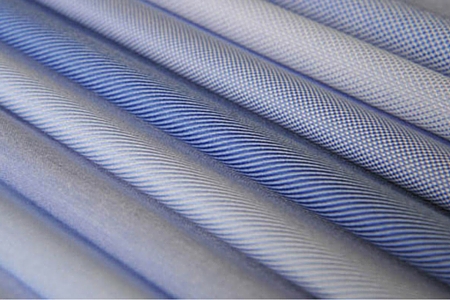 A series of blue fabrics for men's made to measure dress shirt, different varieties