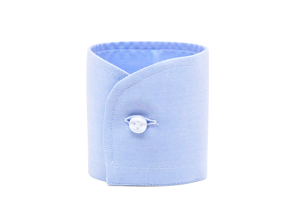 Light blue rounded barrel cuff with white button