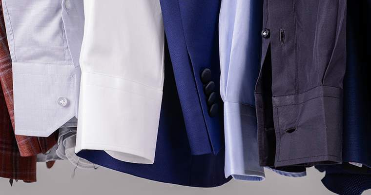 Close up on tailored dress shirts' cuffs, various colors
