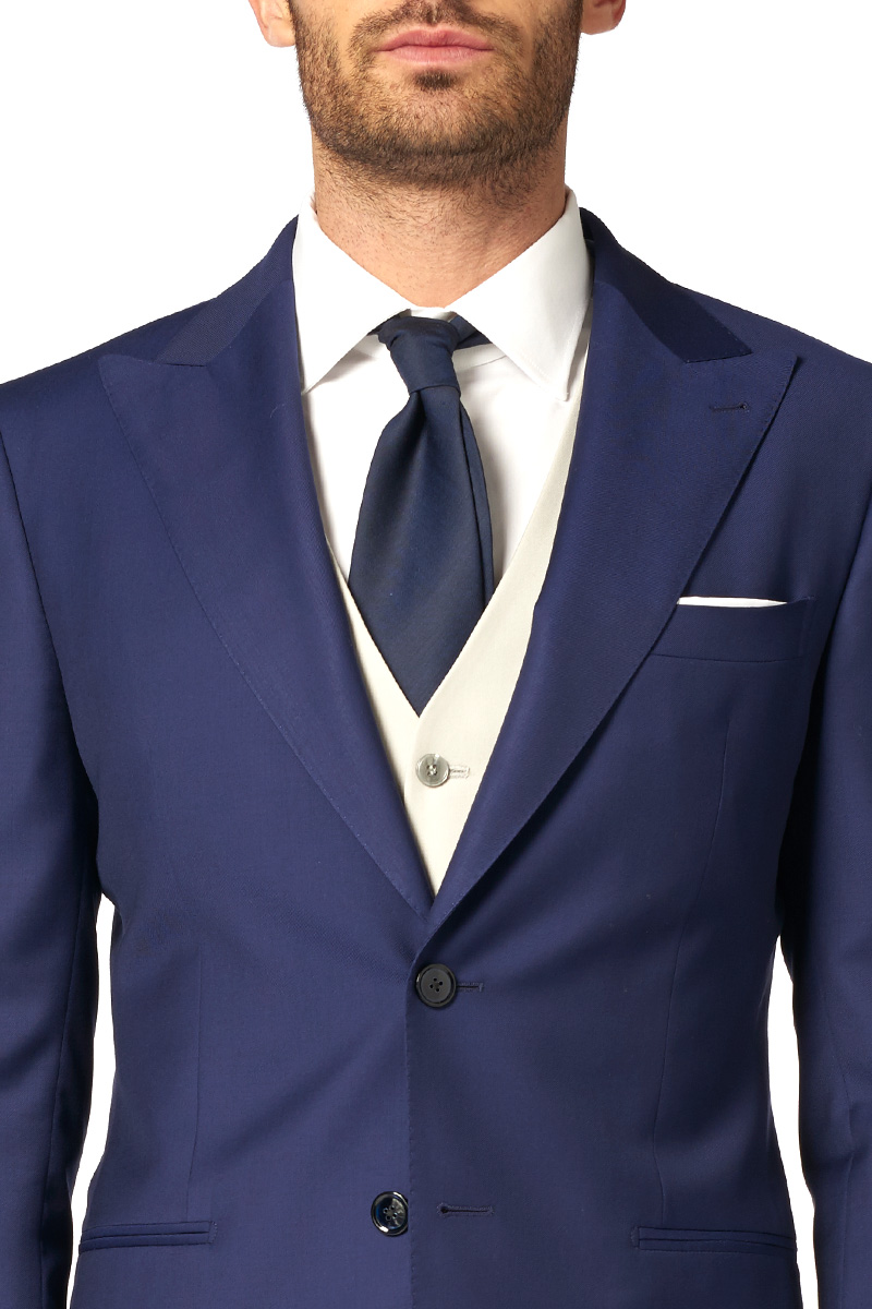 Peak lapel on a two-button blue suit