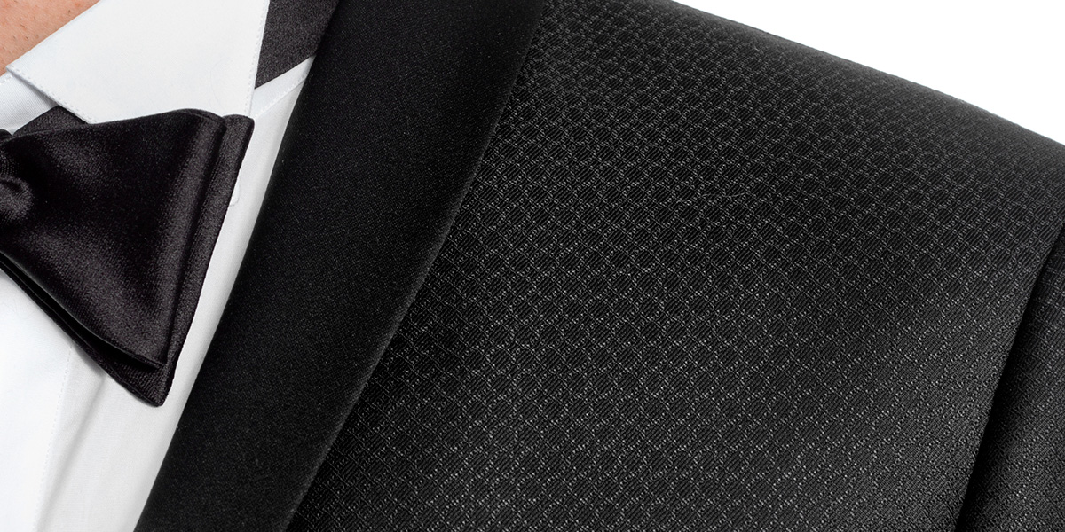 Detail of a shawl collar on a black tuxedo