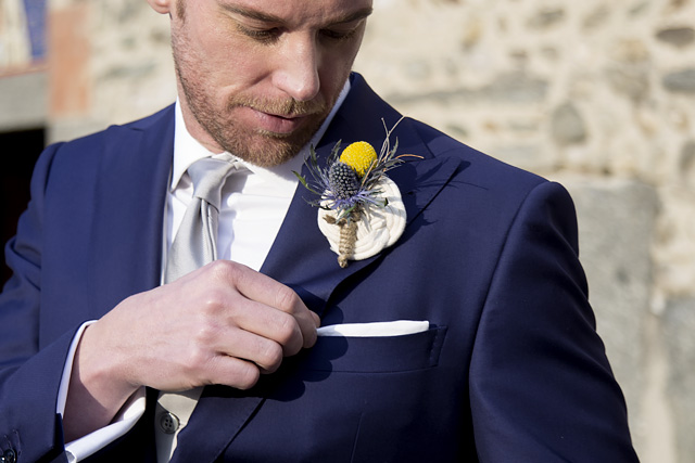 Man wears wedding jacket, boutonniere and pocket square Lanieri