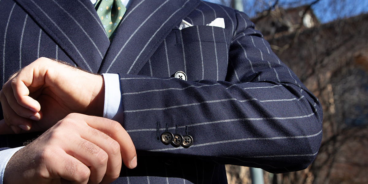 A man's blue jacket tailored in Italy