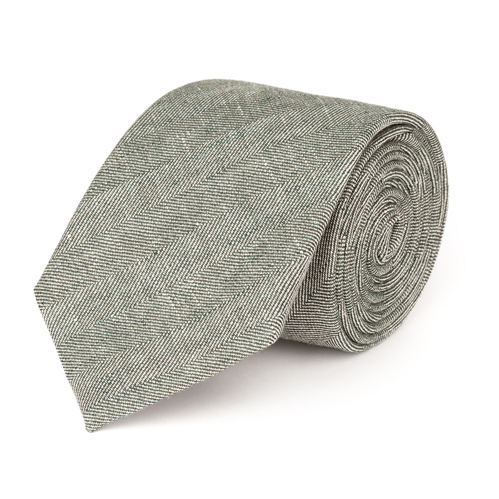 Green summer tie with herringbone motif made from a linen fabric by Lanieri