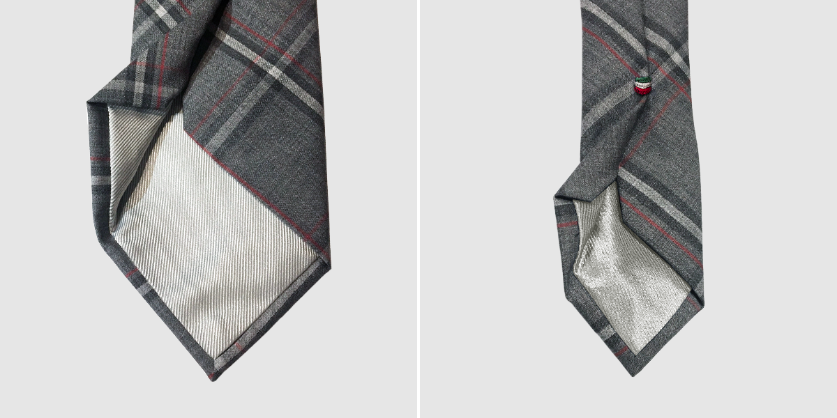 dettaglio cravatta grigia standard o stretta