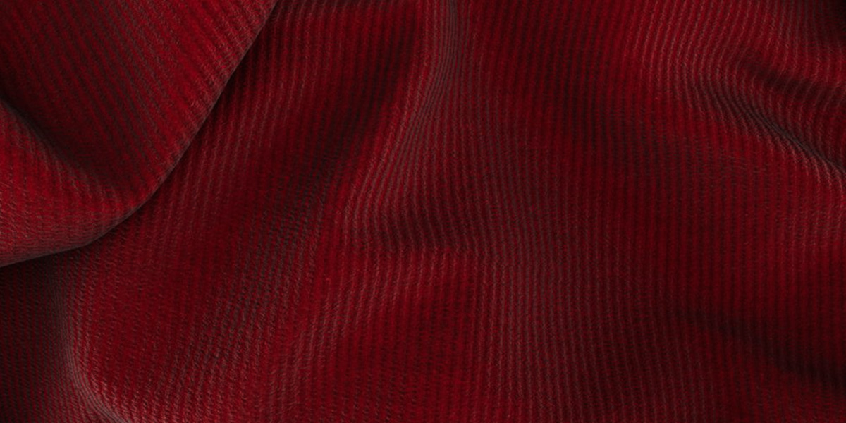 Detail of 100% cotton red fabric in corduroy